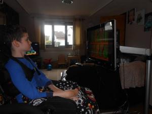 Lewis having a go on his brand new eye gaze communication system for home.